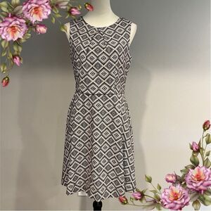 Scoop neck sleeveless fit & flare skater style knee length geometric print